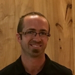 Nicholas E.